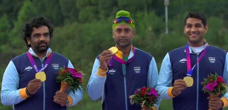 Zoravar Singh Sandhu (centre) with a gold medal at the Asian Games (2022) in Hangzhou, China