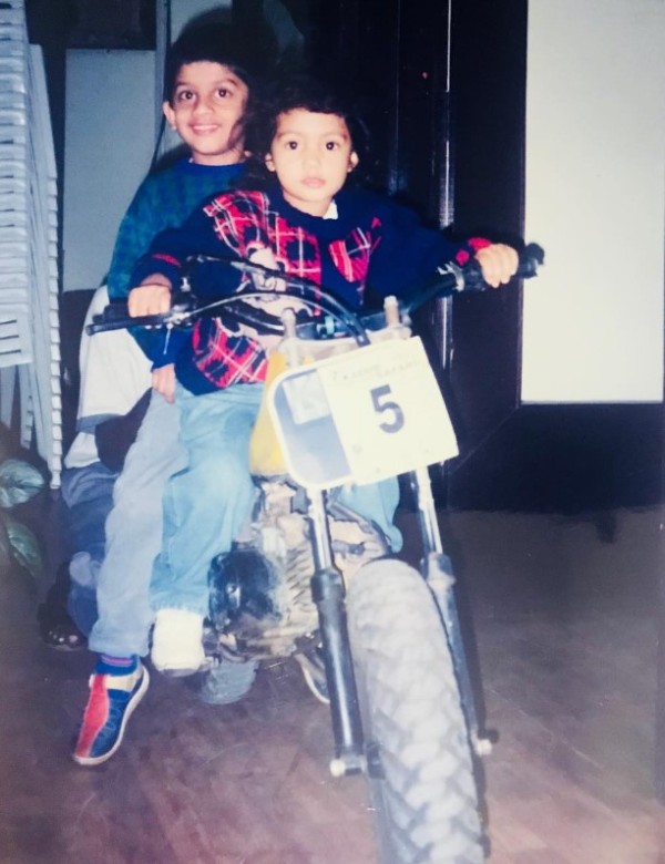 A photo of Shivani Pruthvi riding a motorcycle when she was a child