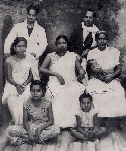 Adoor as an infant with his family