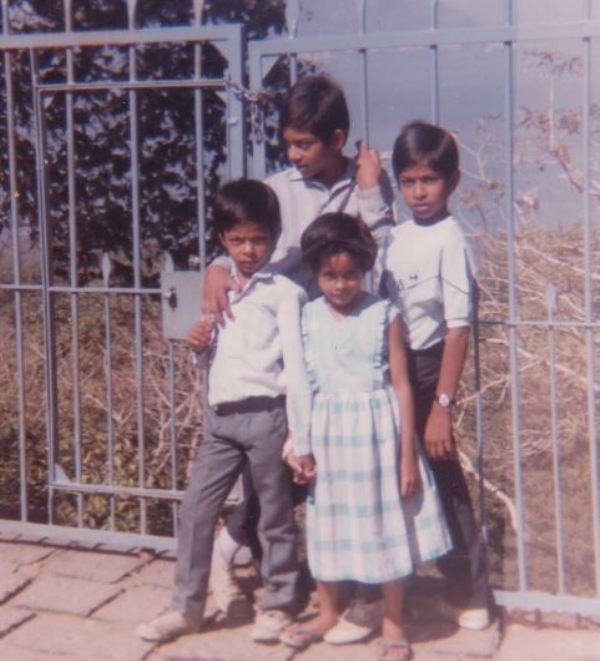 Anuj Singhal (left in front) in his childhood with his siblings