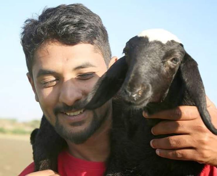 Avinash Surasundra with a goat