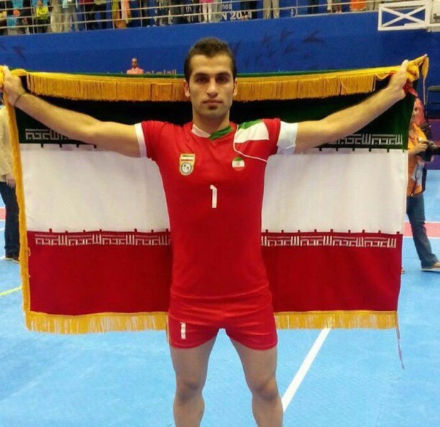 Fazel Atrachali playing for Iran in an international tournament