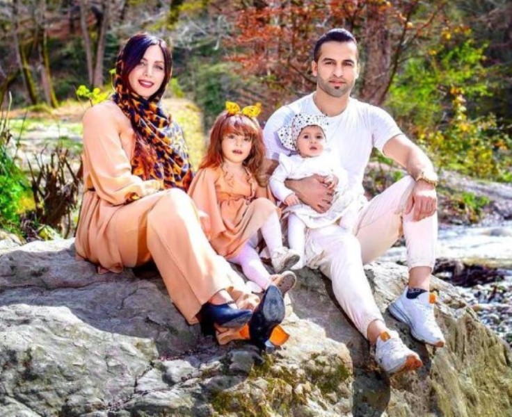 Fazel Atrachali with his wife and two daughters