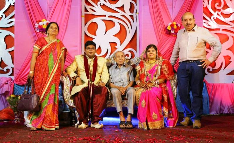 From left to right, Sunita Keswani, Raunaq Keswani, Dada Laxman Das Keswani, Raunaq Keswani's wife, Rajkumar Keswani