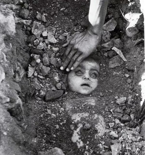 Indian photojournalist Raghu Rai's famous photograph 'Burial of an Unknown Child,' which became the icon of the 1984 Bhopal gas tragedy