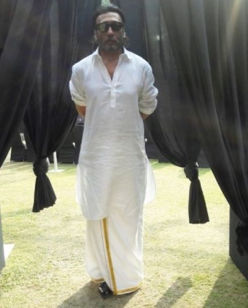 Jackie Shroff posing in white kurta and dhoti