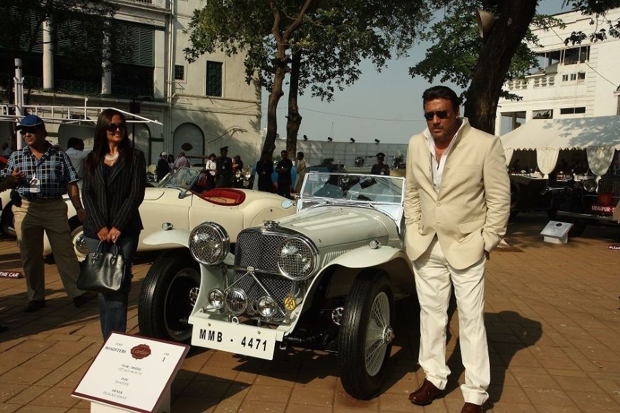 Jackie Shroff standing with his SS Jaguar 100