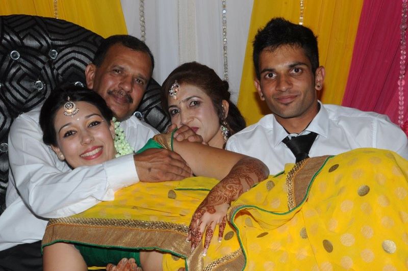Keshav Maharaj with his mother, Kanchan, father, Athmanand, and sister, Tarisma (right to left)