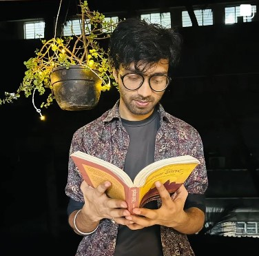 Manish Gaharwar while reading a book