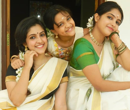 Meenakshi Dinesh with her sisters