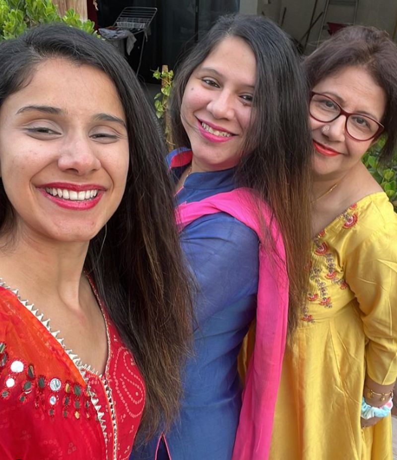 Nidhi Kumar (left) with her sister (centre) and mother (right)