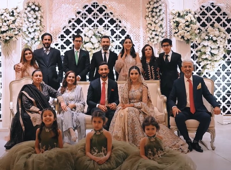 Nische Khan and Shan Masood with their families