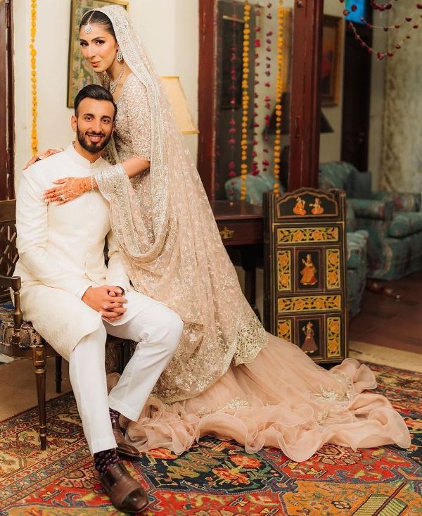 Nische Khan with Shan Masood (sitting) during their wedding photoshoot