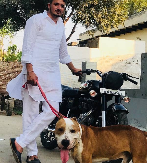 Parvesh Bhainswal with a pet dog