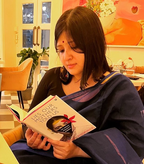 Piya Chakraborty reading a book