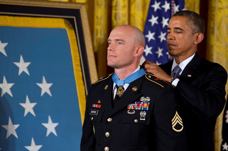 President Barack Obama placed the Medal of Honor around Carter's neck during a White House ceremony in August 2013