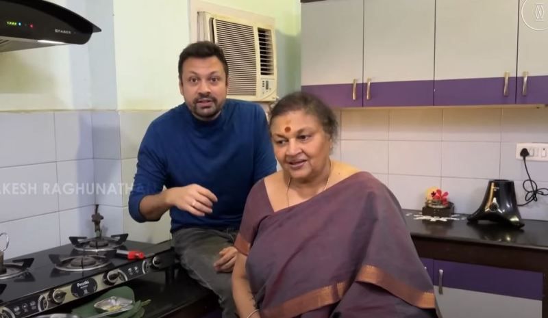 Rakesh Raghunathan with his mother in a still fron the cookery web series 'Ammavum Naanum'