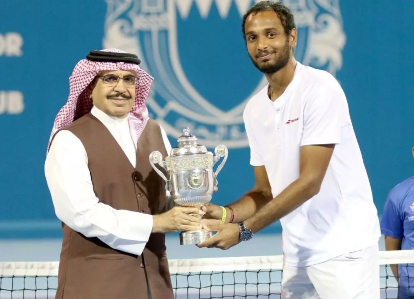 Ramkumar Ramanathan receiving his first singles Challenger title after winning the Manama Challenger in Bahrain