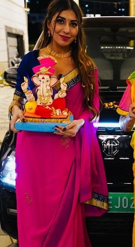 Ruma Sharma with her car