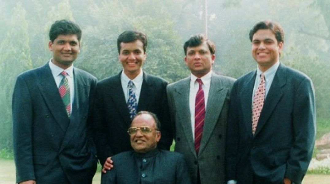 Sajjan Jindal (extreme right) with his father, Om Prakash Jindal (centre, sitting) and his brothers