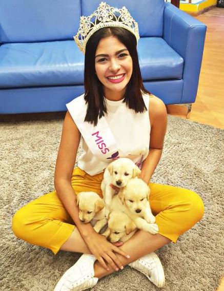 Sheynnis Palacios with her pet dogs