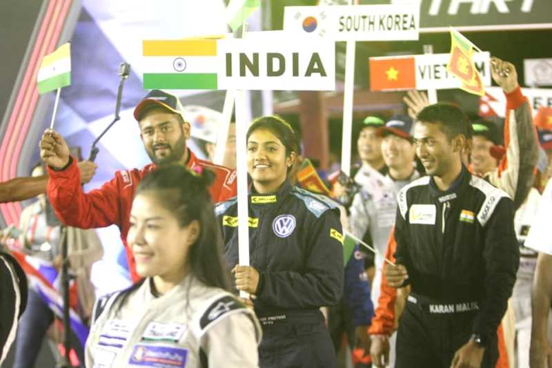 Shivani Pruthvi holding India banner during the 2019 Asia Auto Gymkhana Championship