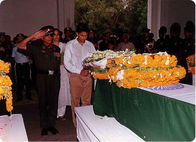 Soldiers and officers of the Indian Army paying their last respects to Vijayant