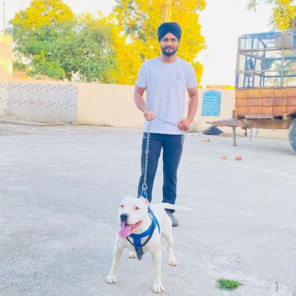 Surinder Singh with his pet dog