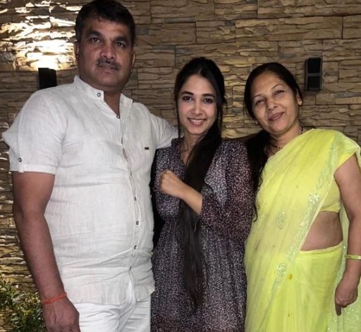 Swati Asthana with her parents