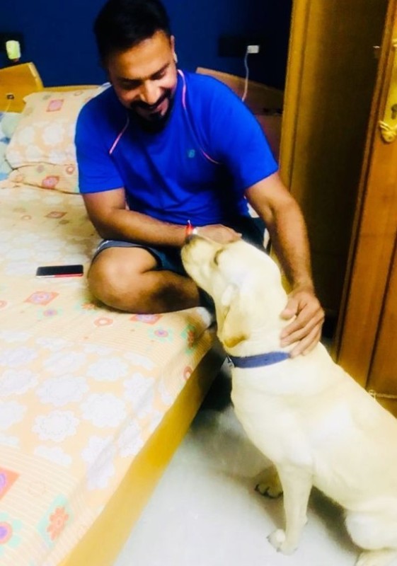 T Dilip with his pet dog