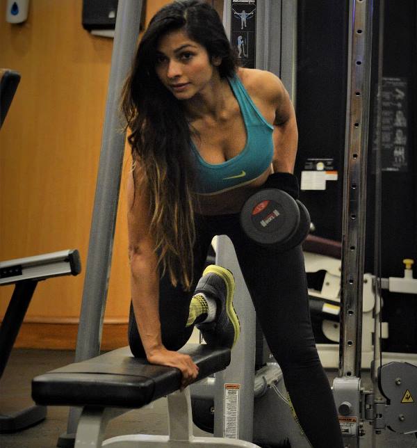 Tanisha Mukerji working out in a gym