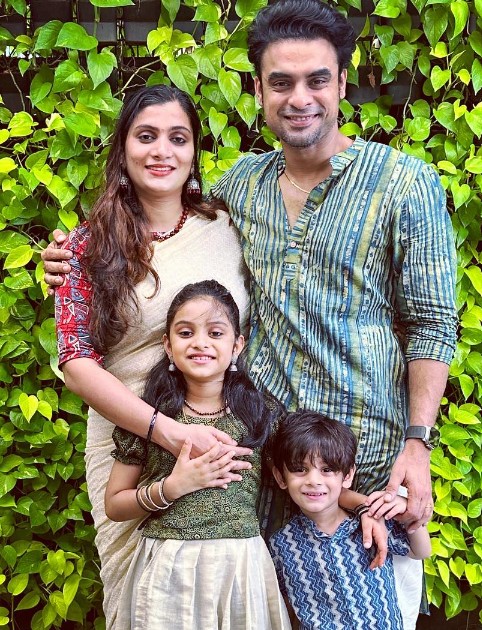 Tovino Thomas with his wife and children