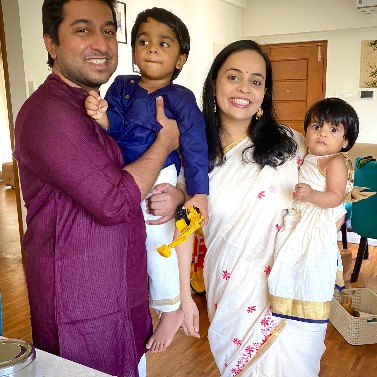 Vineeth Sreenivasan with his wife, son, and daughter
