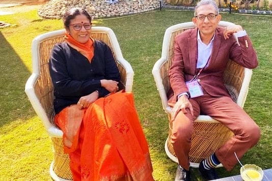 A photo of Nina Singh with Abhijit Banerjee