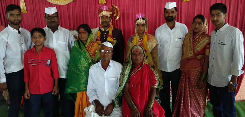 A picture of Deepak Arjun Shinde's (extreme left) parents (sitting) and other family members