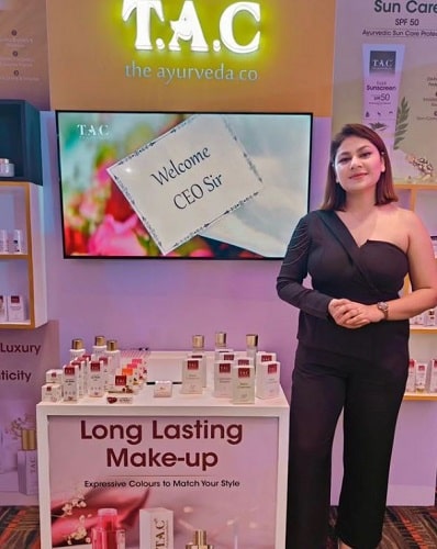 A picture of Shreedha Singh with her brand's products