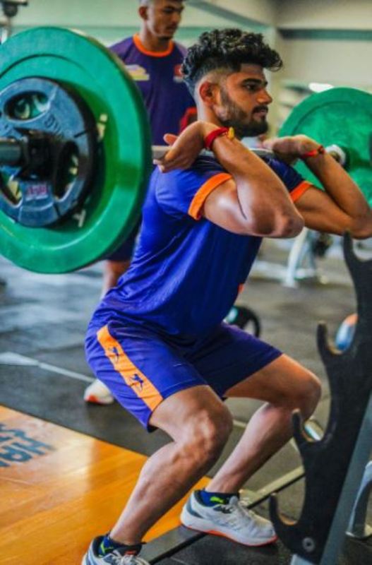 Aditya Shinde working out in gym