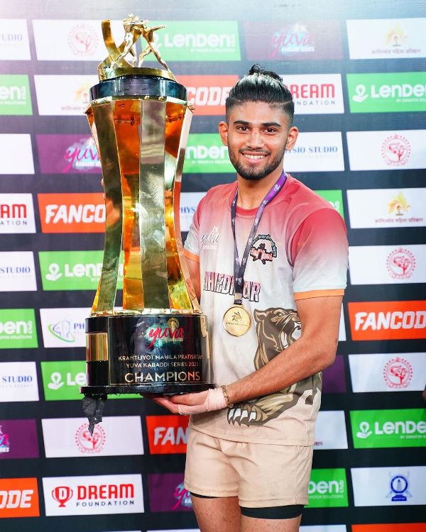 Aditya Shinde posing with the Champions of Yuva Kabaddi series 2023 trophy