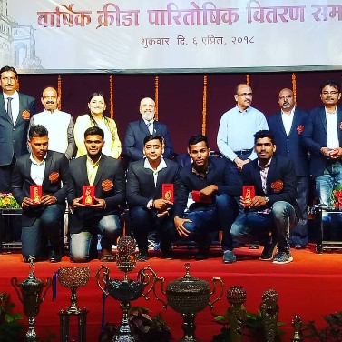 Akshay Jaywant Bodake during a prize distribution ceremony at Pune University