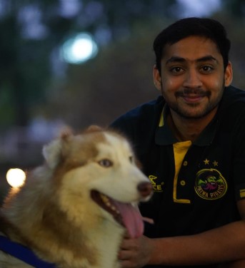 Akshay Jaywant Bodake posing with his pet