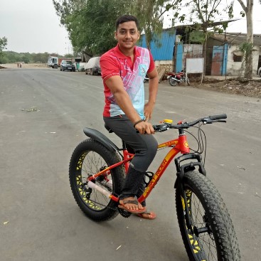 Akshay Jaywant Bodake while riding a bicycle