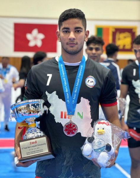 Alireza Mirzaeian posing with his silver medal at the 11th edition of the Asian Kabaddi Championship held in Korea in 2023