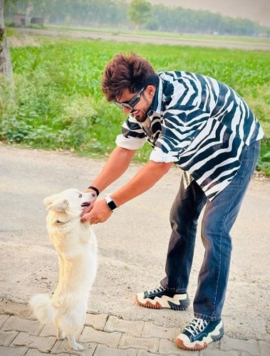 Aman Jaji and his pet dog