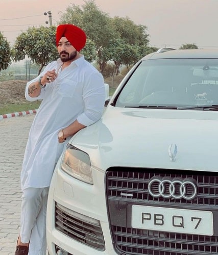 Amanjot Singh and his car