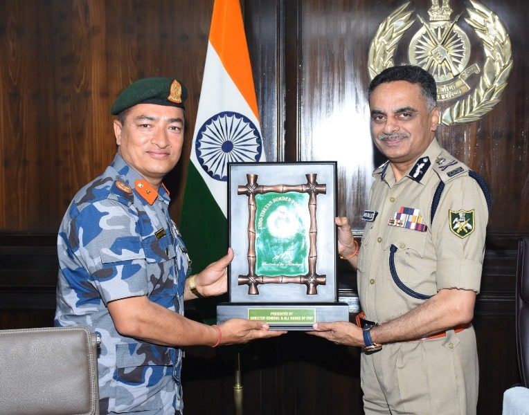 Anish Dayal with his Nepalese counterpart during an interaction
