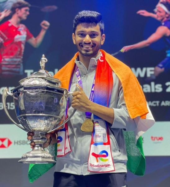 Arjun M. R. posing with the 2022 Thomas Cup which he won for the men's team event