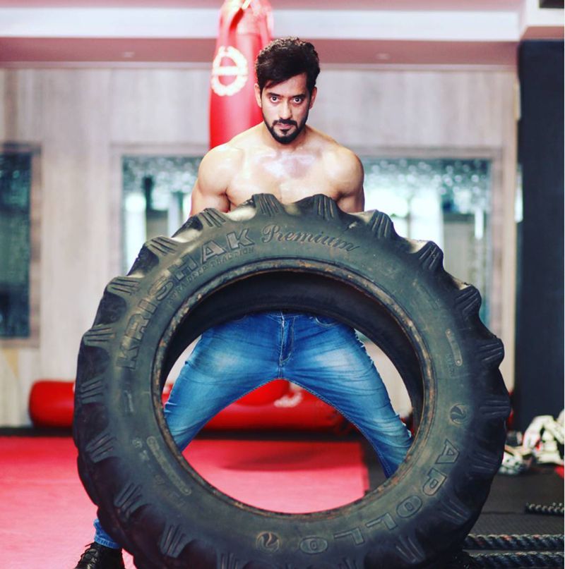 Asthik Avinash Shetty working out at the gym