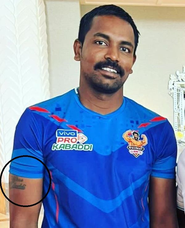 Chandran Ranjith's tattoo on his right bicep