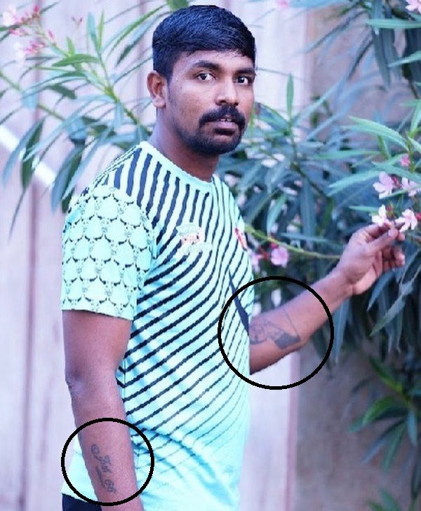 Chandran Ranjith's tattoo on his right forearm and left forearm