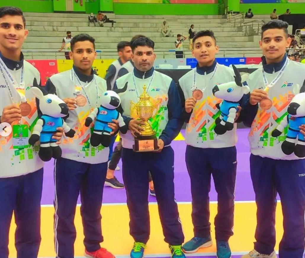 Dadaso Shivaji Pujari (second from right) after winning the bronze medal at the Khelo India Youth Games 2021